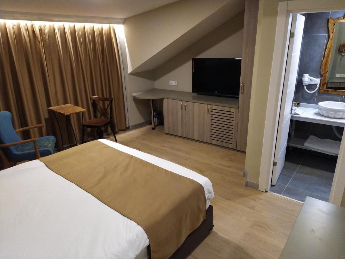 Jakaranda Hotel Istanbul Bagian luar foto